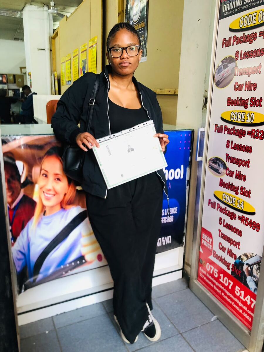 Thabo La Kgosi Driving School student with her licence